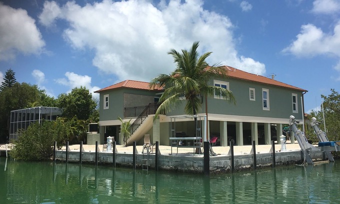 Cudjoe Key House | Gorgeous New 4/3 With Heated Pool/Spa And Large Deep Water Boat Dock