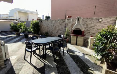 Lizzano Apartment | Grande Bilocale con giardino