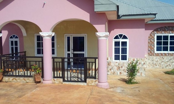 Ashanti Region House | Green Square Guest House is a house with eight private bedrooms each with its.