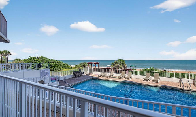 Seawinds Condo Condo | Ground floor direct oceanfront condo with a private poolside balcony and garage parking