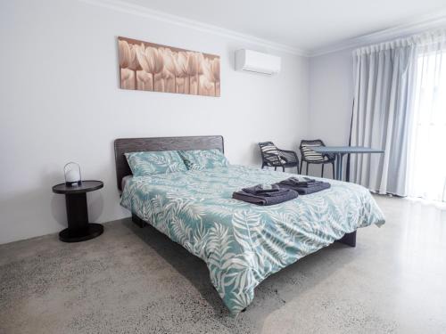 Vasse House | Guest Room with Ensuite & Private Entrance by P2 Living