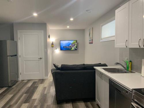 Regina Apartment | Guest Suite in Regina - Queen Bed