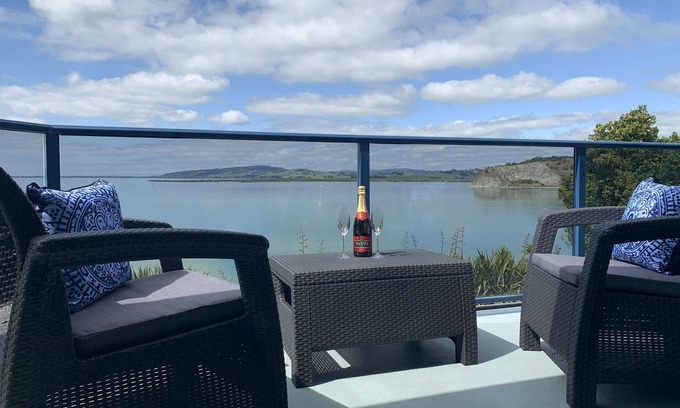 Onerahi Apartment | Harbour views from super spacious upstairs apartment. Fully equipped.