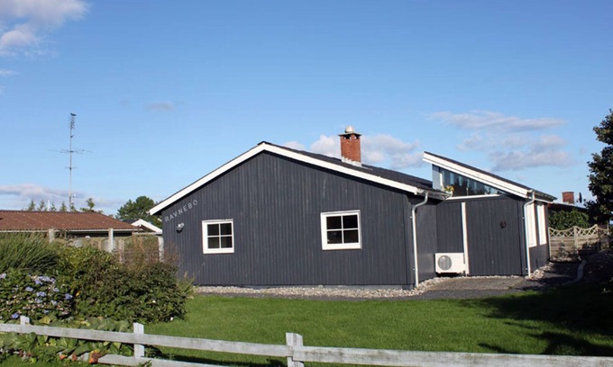 Diernæs Strandby House | Harmoniously renovated vacation home near the beach with a view of the water