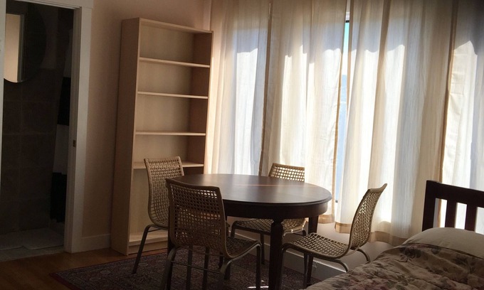 Sunnyside Apartment | Has a huge deck, BBQ,Table,Chairs