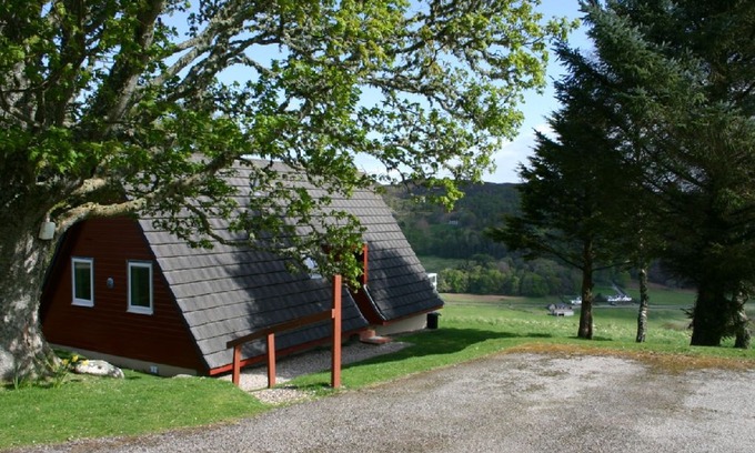 Rogart Villa | Highland hillside hideaway. Lodge with view of glen and Sutherland mountains.