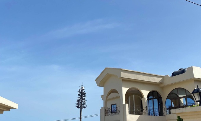 Mallam House | Hilltop Grandeur: 8-Bedroom With Stunning Views of Accra and Pambros Waters