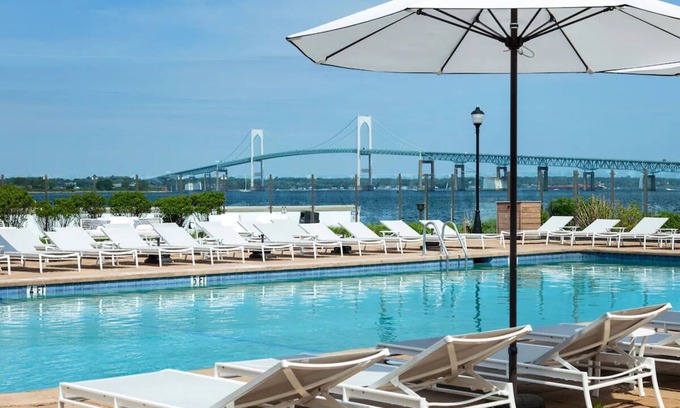 Goat Island Hotel | Historic Downtown Retreat | Resort with Scenic Water View | Outdoor Pool