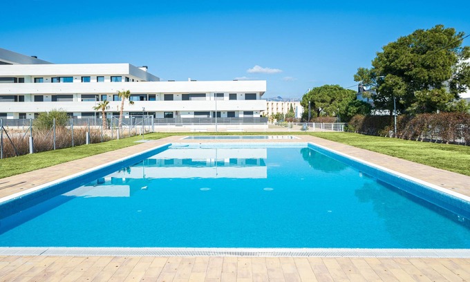 Roques Daurades Apartment | Holiday Apartment 'Marina' with Sea View, Terrace, Shared Pool & Wi-Fi