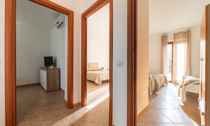 Masainas Apartment | Holiday Apartment "Is Lais 3" with Sea View, Shared Garden & Wi-Fi