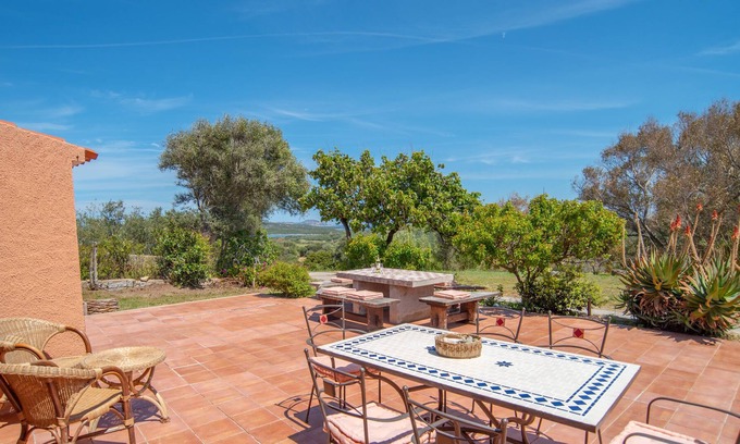 Santa Teresa di Gallura Villa | Holiday Home in Idyllic Location with Wi-Fi, Garden and Sea View; Parking available; Pets allowed
