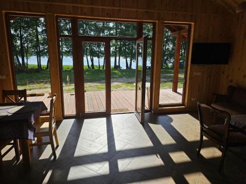 Szczecinek House | Holiday Home by Lake Wierzchowo with Boats