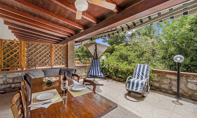Portoscuso House | Holiday Home 'Casa Di Rita' with Shared Pool, Private Terrace and Air Conditioning