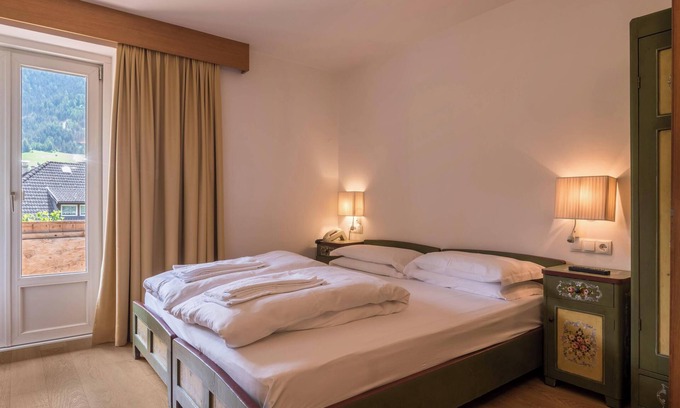 Ortisei House | Holiday Home 'Dolomiti Rondula' with Mountain View, Shared Pool and Wi-Fi