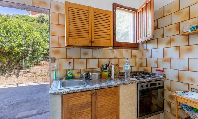 Marina di Gutturu Flumini House | Holiday Home 'Villetta Cattarì' with Sea View, Private Terrace and Private Garden