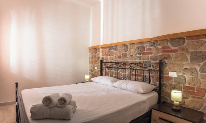 Santa Margherita di Pula House | Holiday Home “Marisol” close to the Beach with Wi-Fi, A/C, Terraces & Garden
