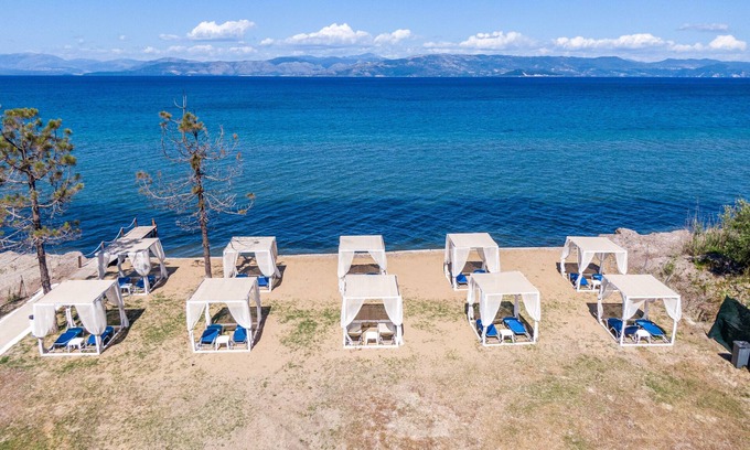 Kavos House | Holiday Home 'Sandy Beach House-1st Floor' with Shared Pool, Wi-Fi and Air Conditioning