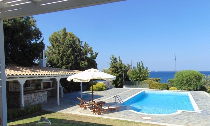 Saronida Villa | Holiday seafront villa with private pool
