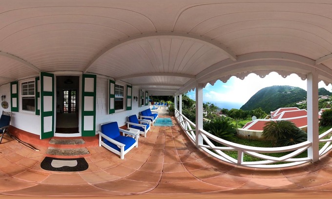 Windward Side House | Home a way from home in the Unspoiled queen of the Caribbean.