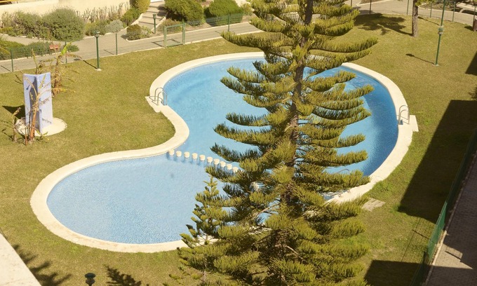 Grao de Gandia Apartment | Homerez - Appartement 500 m away from the beach for 6 ppl. with shared pool