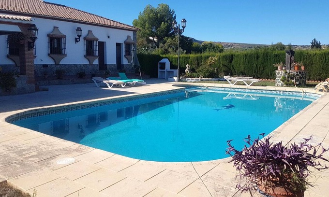 Arriate House | Homerez - House for 8 ppl. with swimming-pool, garden and terrace at Arriate
