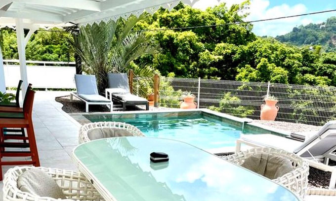 Le Francois Villa | Homerez - Nice villa for 4 ppl. with swimming-pool and sea view at Le François