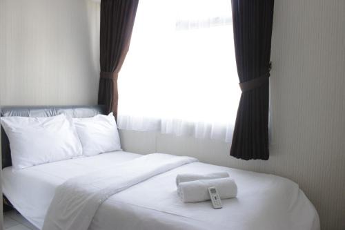 Cipaganti Apartment | Homey 2BR Apartment at The Jarrdin Cihampelas By Travelio