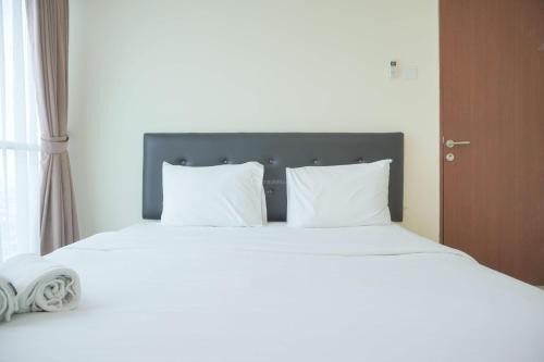 Kayu Putih Apartment | Homey and Comfortable 2BR Tifolia Apartment By Travelio