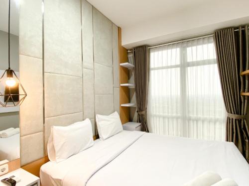Cikarang Apartment | Homey and Minimalist 1BR Vasanta Innopark Apartment By Travelio
