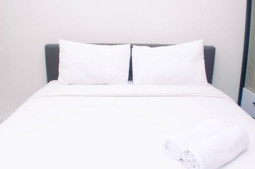 Cikarang Apartment | Homey and Minimalist Studio at Vasanta Innopark Apartment By Travelio