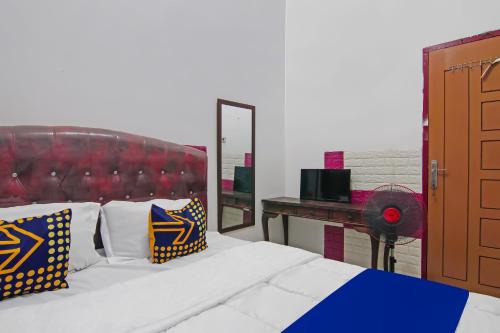 Pekanbaru Hotel | Hotel O Putri Guest House Syariah Near SPBU Rimbo Panjang
