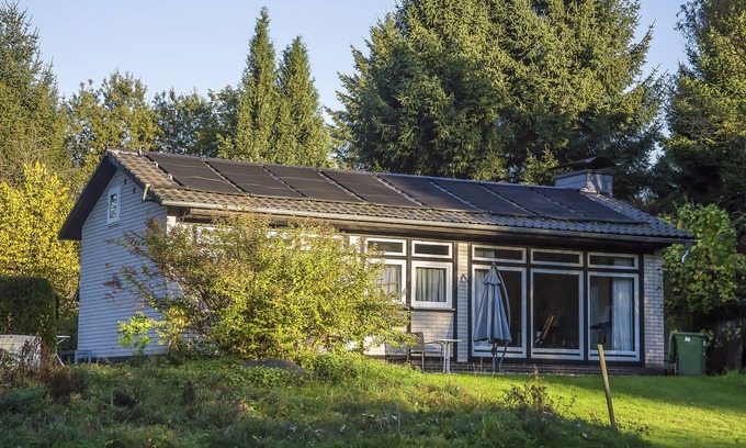 Laubach House | House Milan with saltwater pool, conservatory and fireplace in a large garden