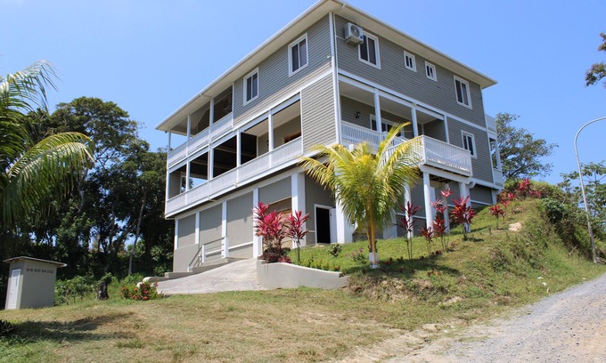 Dixon Cove House | House on a Hill with Astonishing Ocean Views
