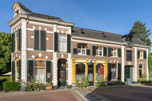 Dieren Apartment | Huis met de Leeuwenkoppen
