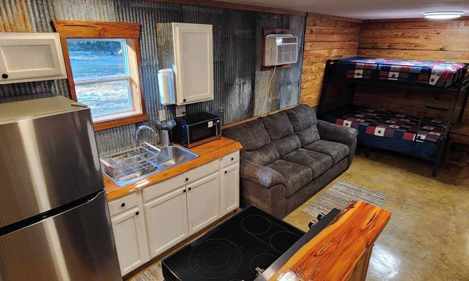 Fairbanks House | Hunters & Heroes Hideaway. Cozy barn studio in tranquil Loch Arbor area.