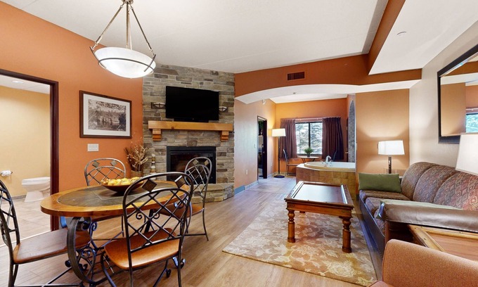Lyndon Station Condo | Ideally located condo with fireplace, jetted tub, on-site golf, & central AC