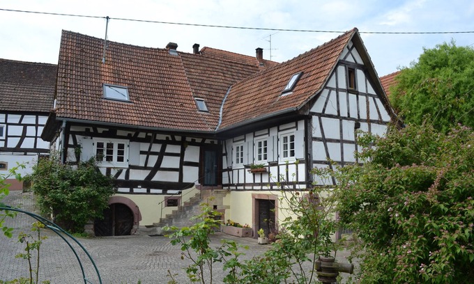 Cleebourg House | Idyllic half-timbered house with a large garden and playground and orchard