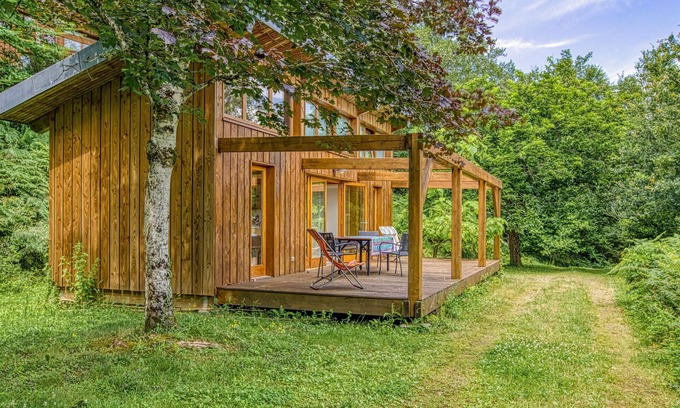 Mirandol-Bourgnounac House | In idyllic location of a forest and near the river Vaur is this cozy wooden house.