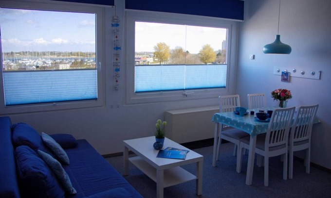 Fehmarn Apartment | Inselblume 65 - vacation home by the sea, view to the marina