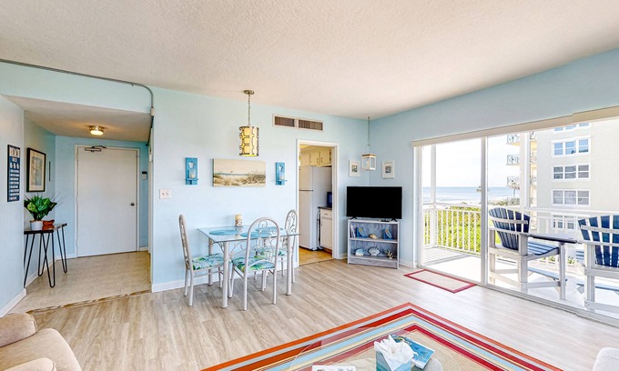 South Patrick Shores Condo | Inviting condo with ocean view, balcony, full kitchen, central AC, & W/D