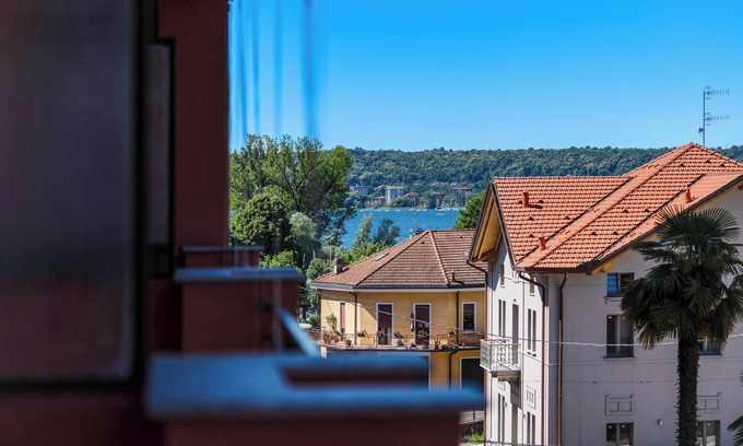Angera Apartment | Iris Apartment Lake Maggiore with Lake View, Balconies, Air Conditioning and Wi-Fi