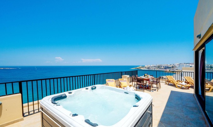 Bugibba Apartment | Islet Seafront Penthouse with breath seaviews hot tub on large terrace