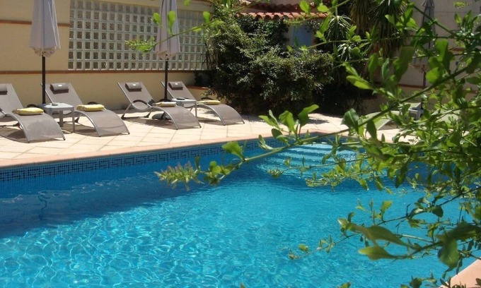 Espira de l'Agly Apartment | Ivy covered stone Mas part of an 18th century former convent.
