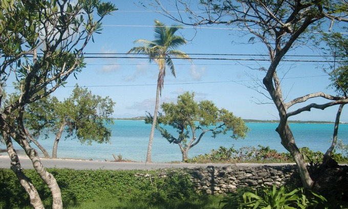 George Town Cottage | Ixora West - Views over Elizabeth harbor, beach access across the road.