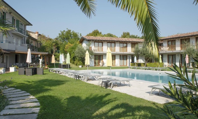 Pieve Vecchia Apartment | Junior Suite 1 with Shared Pool and Private Balcony