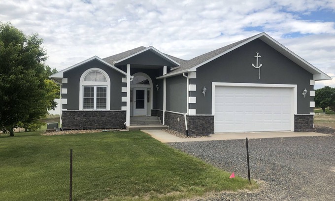 Lonergan House | Just steps to the beach. Lakefront Property with Endless Views.