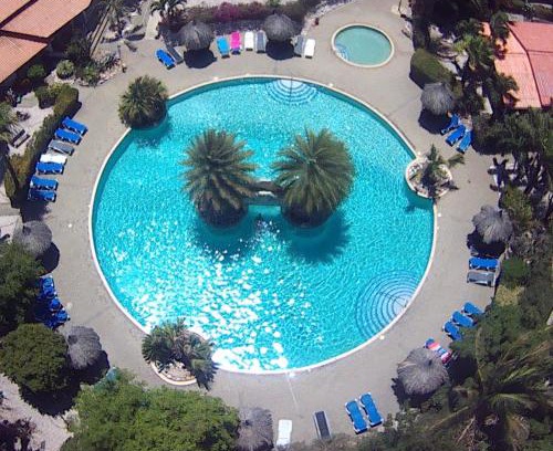 Willemstad Apartment | Kas di BaMi A-194 op Seru Coral Resort - Ruim appartement met groot zwembad en tropische tuin