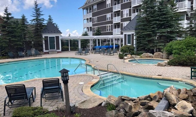Snowshoe Apartment | King Bed Slope Side Retreat in Village Central