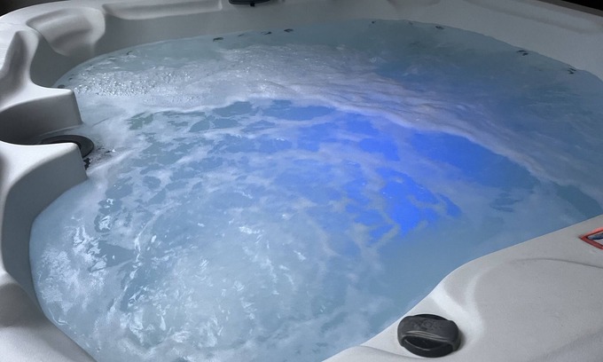 Black Mountain Apartment | King sized Guest Suite with Private Hot Tub, In Town location.