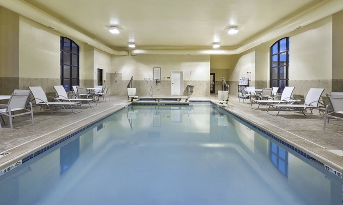 Okemos Condo | King Suite. Free Breakfast.